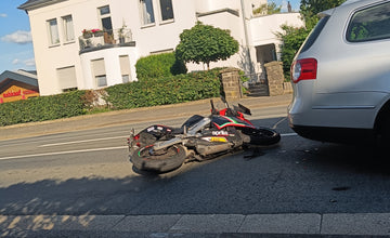 Crashed Aprilia RS4 125 on the road after the 2022 accident that started EuroFairings
